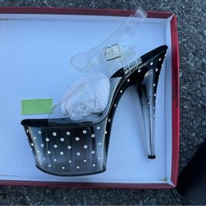 PLEASER Ankle Strap Sandal with Rhinestone Studded Bottom.